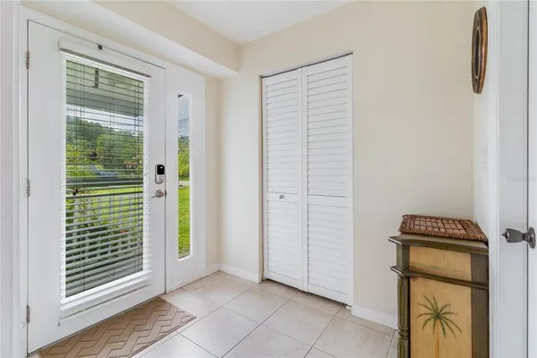 a view of empty room with floor to ceiling window
