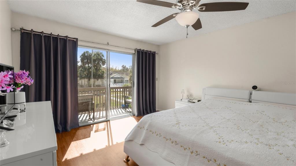 6519 West Newberry Road, Unit 912 Gainesville, FL 32605 - Photo 29 of 47 a bedroom with a bed and a window