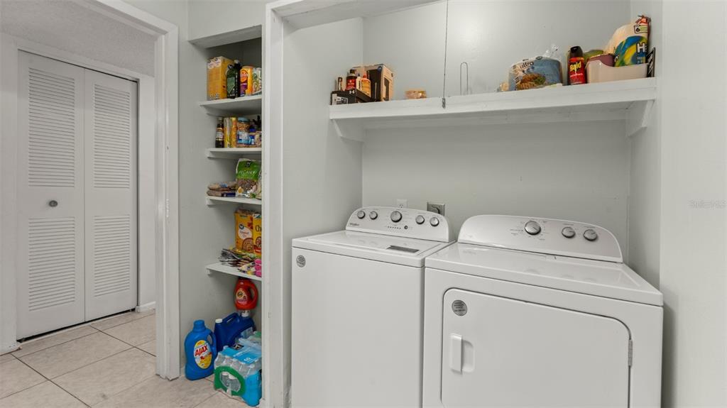 6519 West Newberry Road, Unit 912 Gainesville, FL 32605 - Photo 32 of 47 a utility room with dryer and washer
