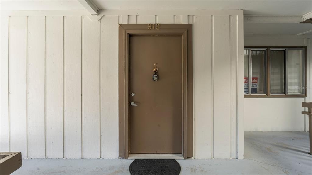 6519 West Newberry Road, Unit 912 Gainesville, FL 32605 - Photo 9 of 47 a view of a wardrobe