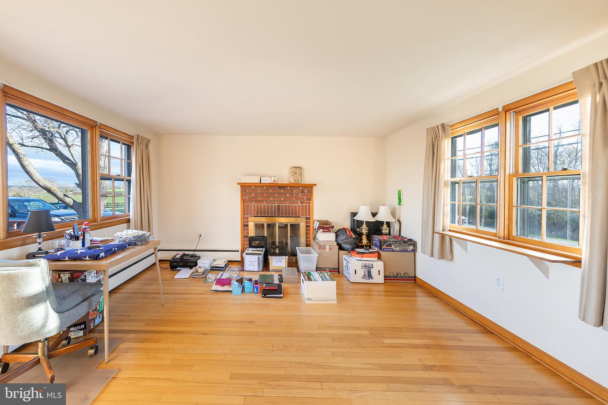 23045 Watson Road Leesburg, VA 20175 - Photo 16 of 69 a living room with furniture and a large window