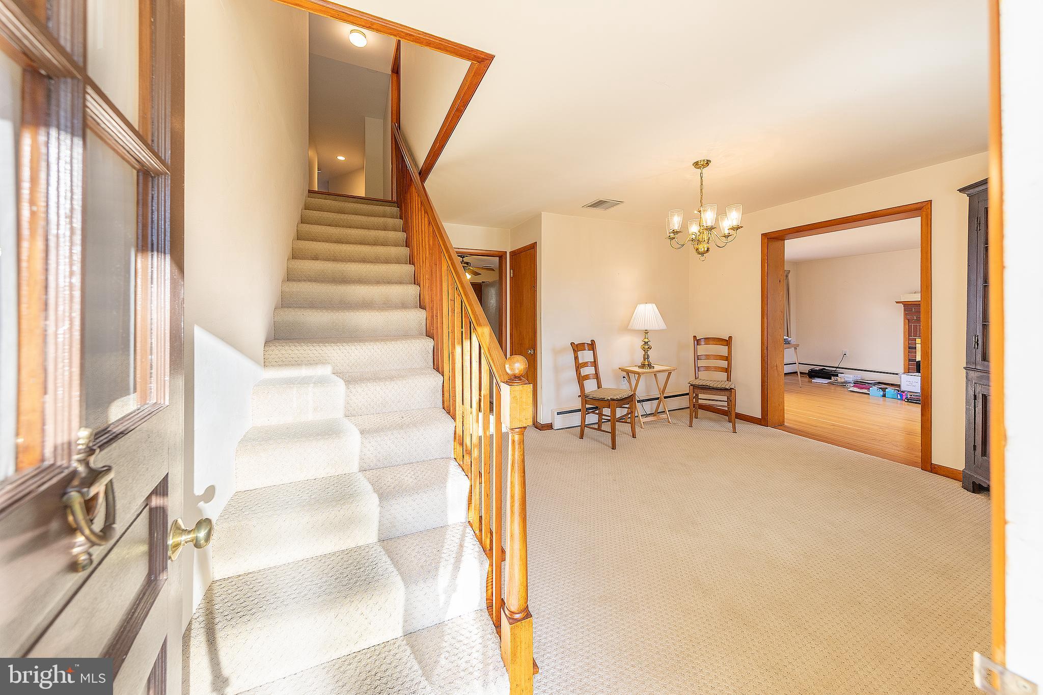 23045 Watson Road Leesburg, VA 20175 - Photo 26 of 69 a view of living room with furniture and fireplace