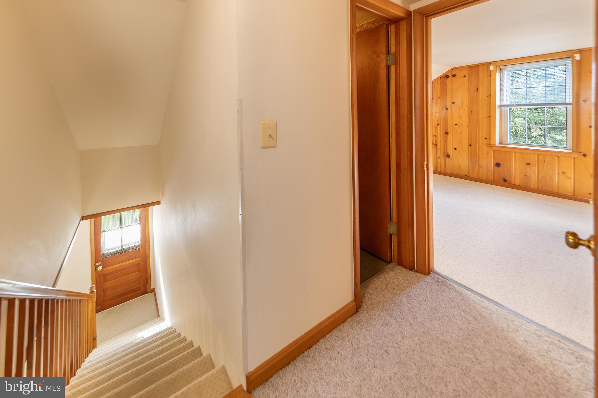 23045 Watson Road Leesburg, VA 20175 - Photo 27 of 69 a view of a hallway with wooden floor and windows