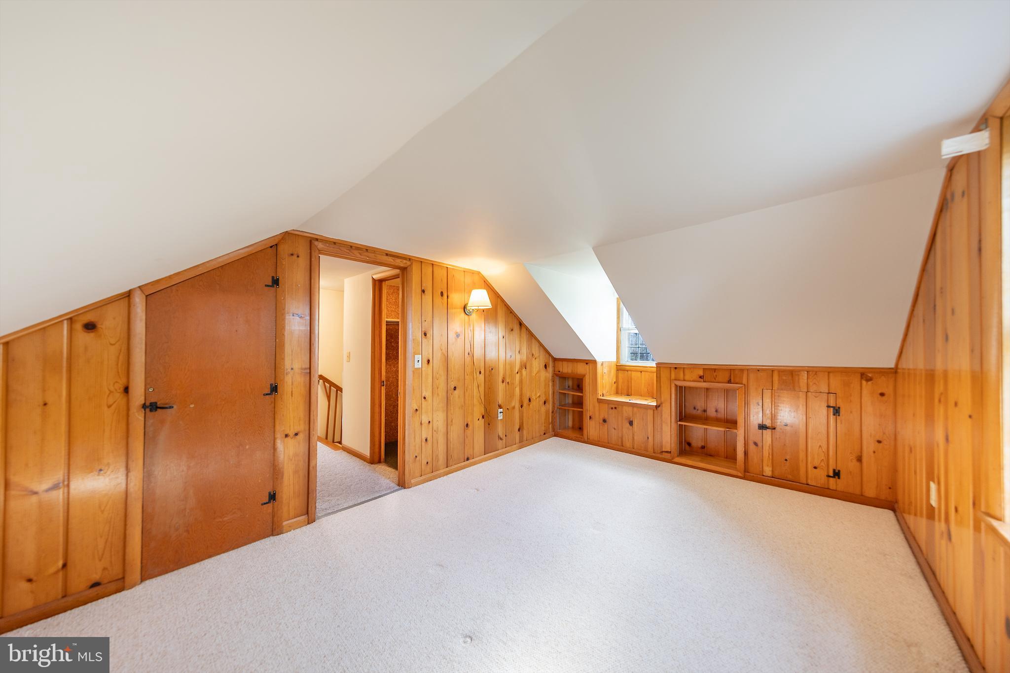 23045 Watson Road Leesburg, VA 20175 - Photo 29 of 69 a view of a hallway with wooden fence
