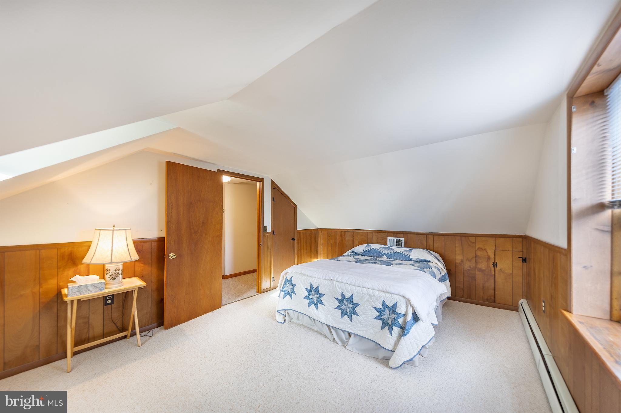 23045 Watson Road Leesburg, VA 20175 - Photo 31 of 69 a bedroom with a bed and a cabinets