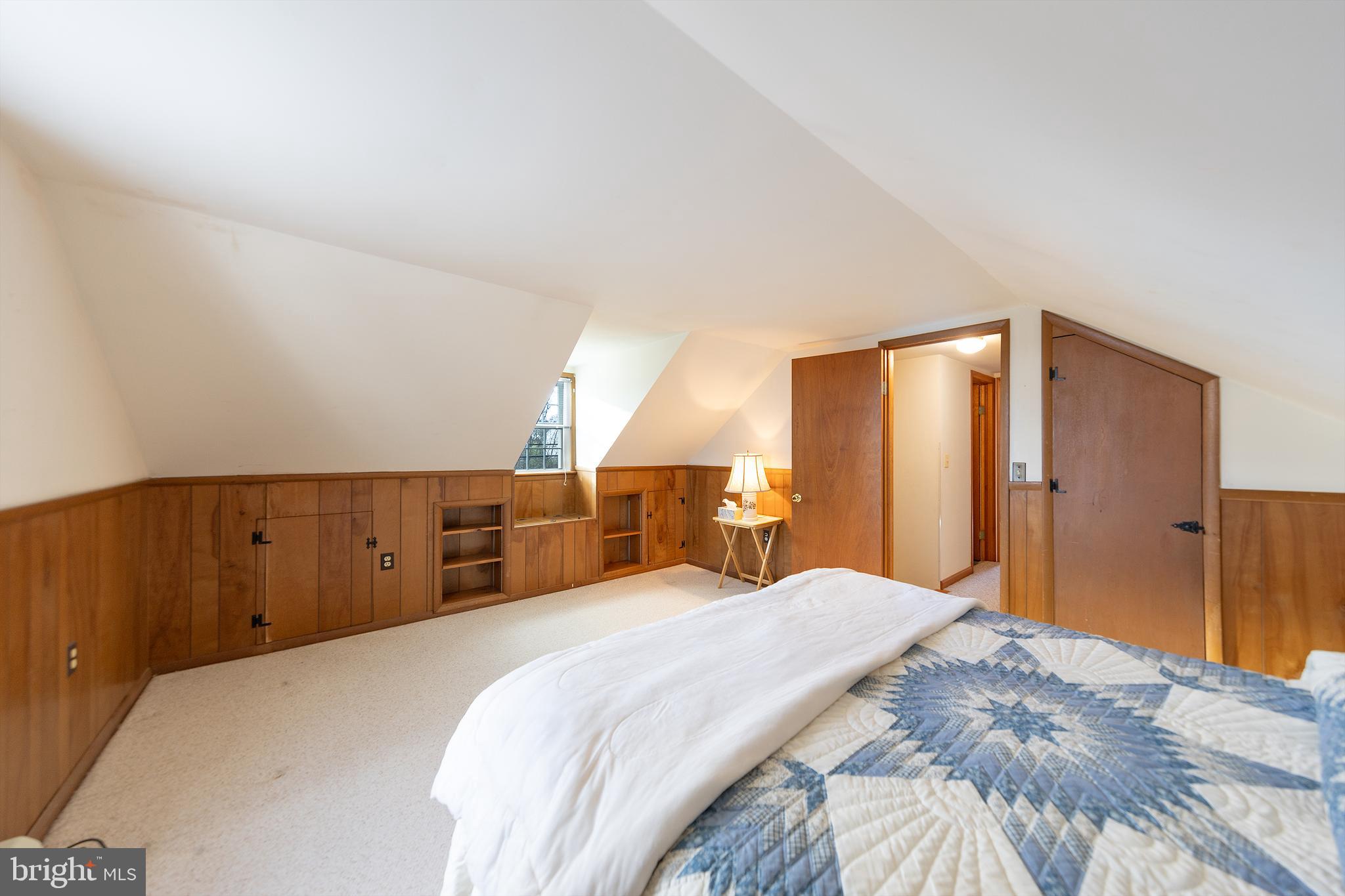 23045 Watson Road Leesburg, VA 20175 - Photo 32 of 69 a bedroom with a large bed and wooden floor