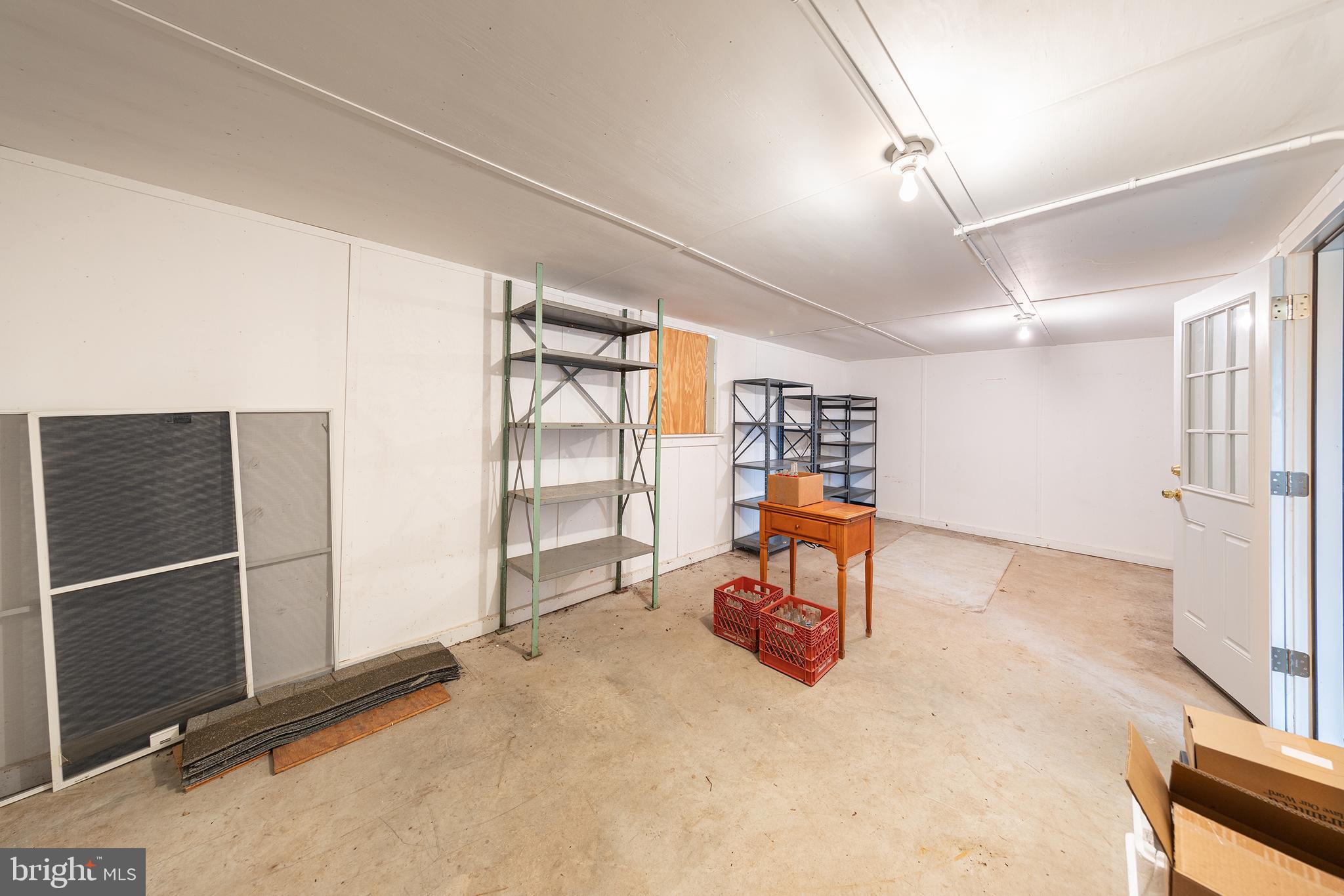 23045 Watson Road Leesburg, VA 20175 - Photo 43 of 69 an empty room with furniture and white walls