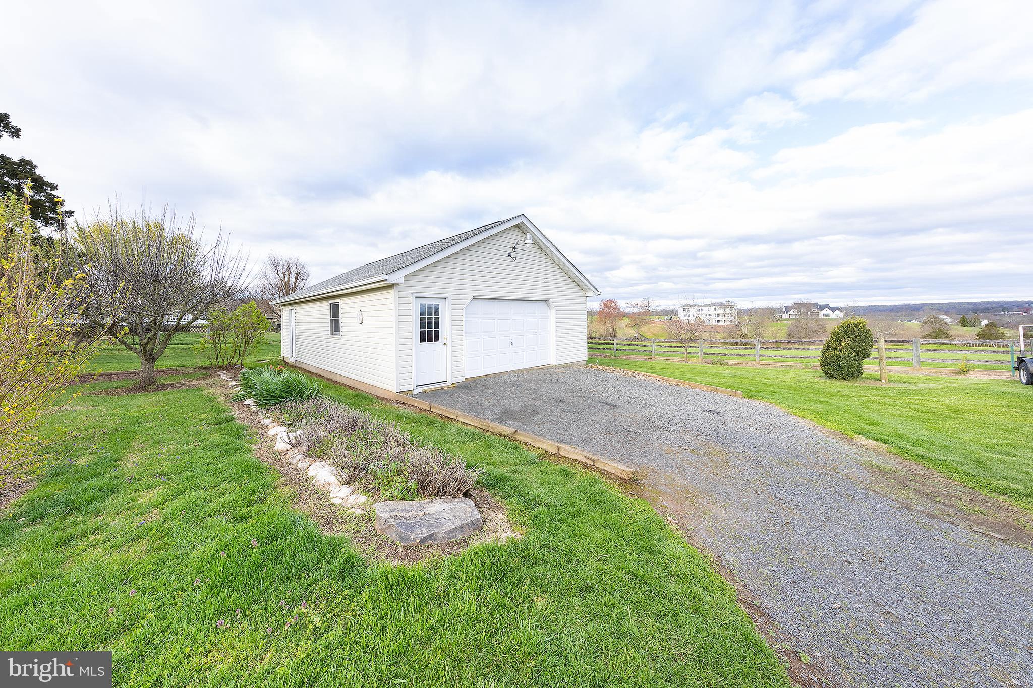 23045 Watson Road Leesburg, VA 20175 - Photo 45 of 69 a view of an house with backyard and garden