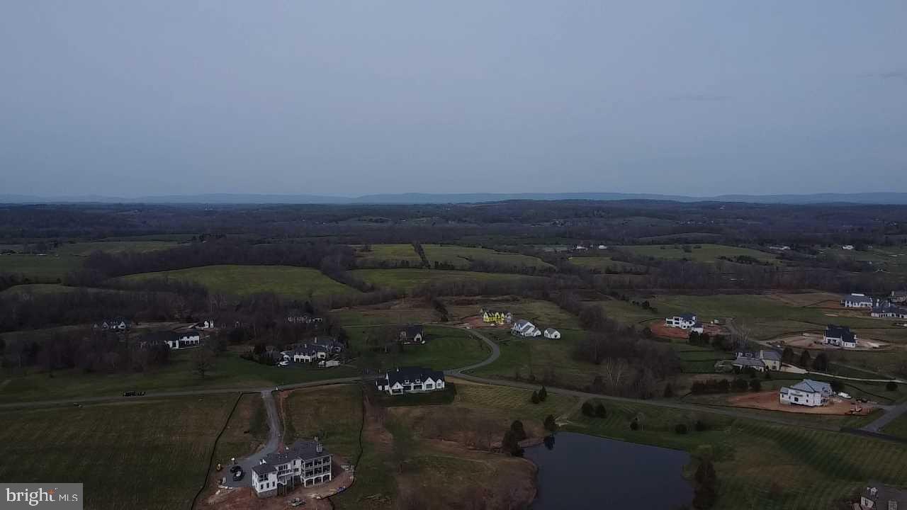 23045 Watson Road Leesburg, VA 20175 - Photo 58 of 69 an aerial view of a house with a yard