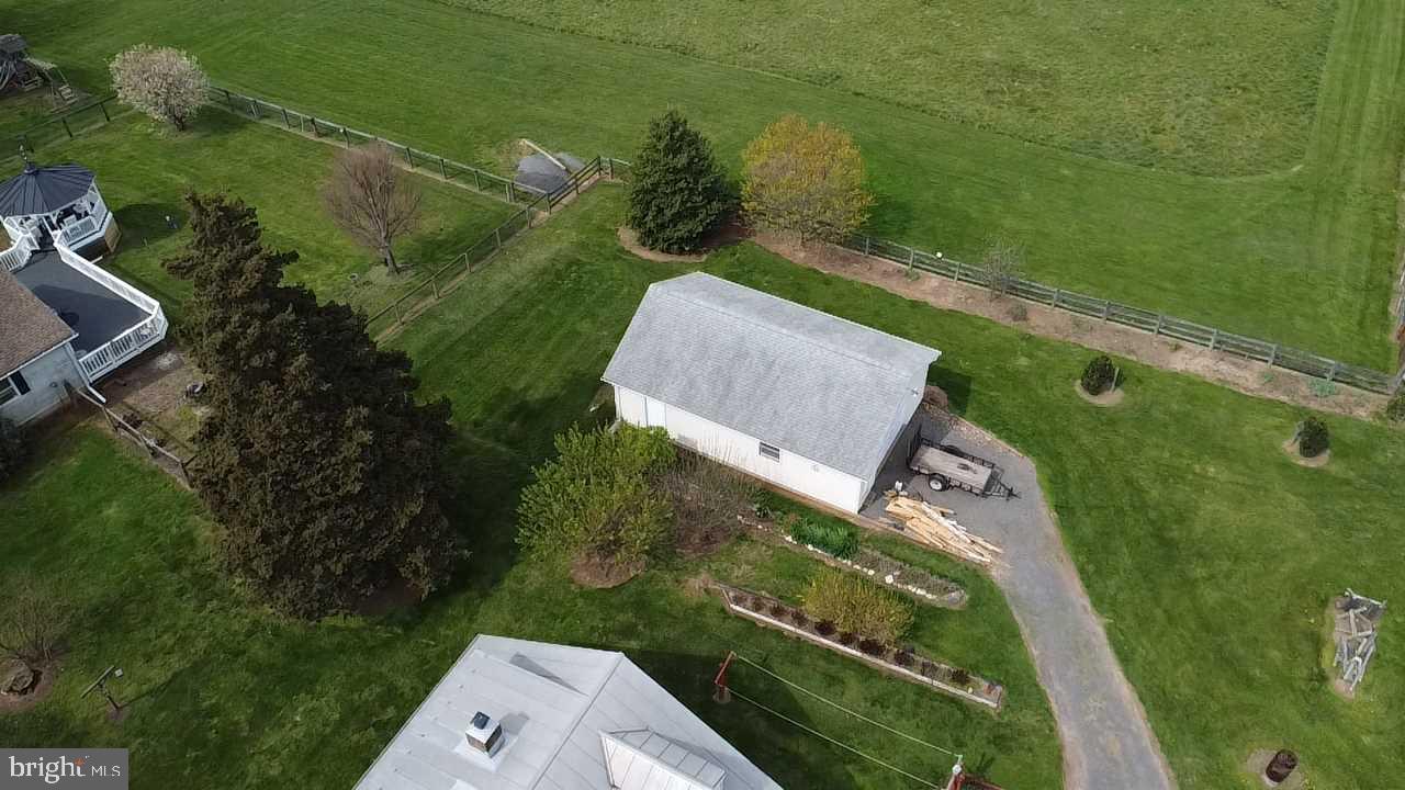 23045 Watson Road Leesburg, VA 20175 - Photo 59 of 69 a view of a yard with a swimming pool