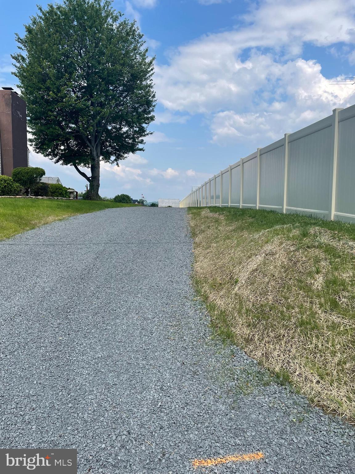 23045 Watson Road Leesburg, VA 20175 - Photo 65 of 69 a view of a yard with wooden fence