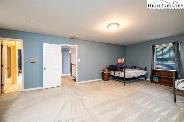 a room with furniture and windows