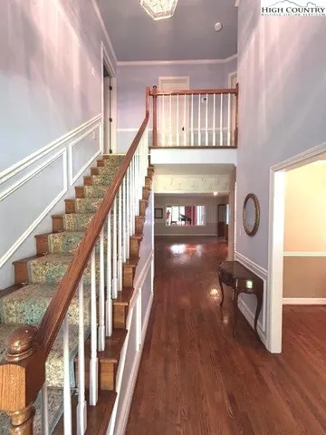 a view of an entryway wooden floor
