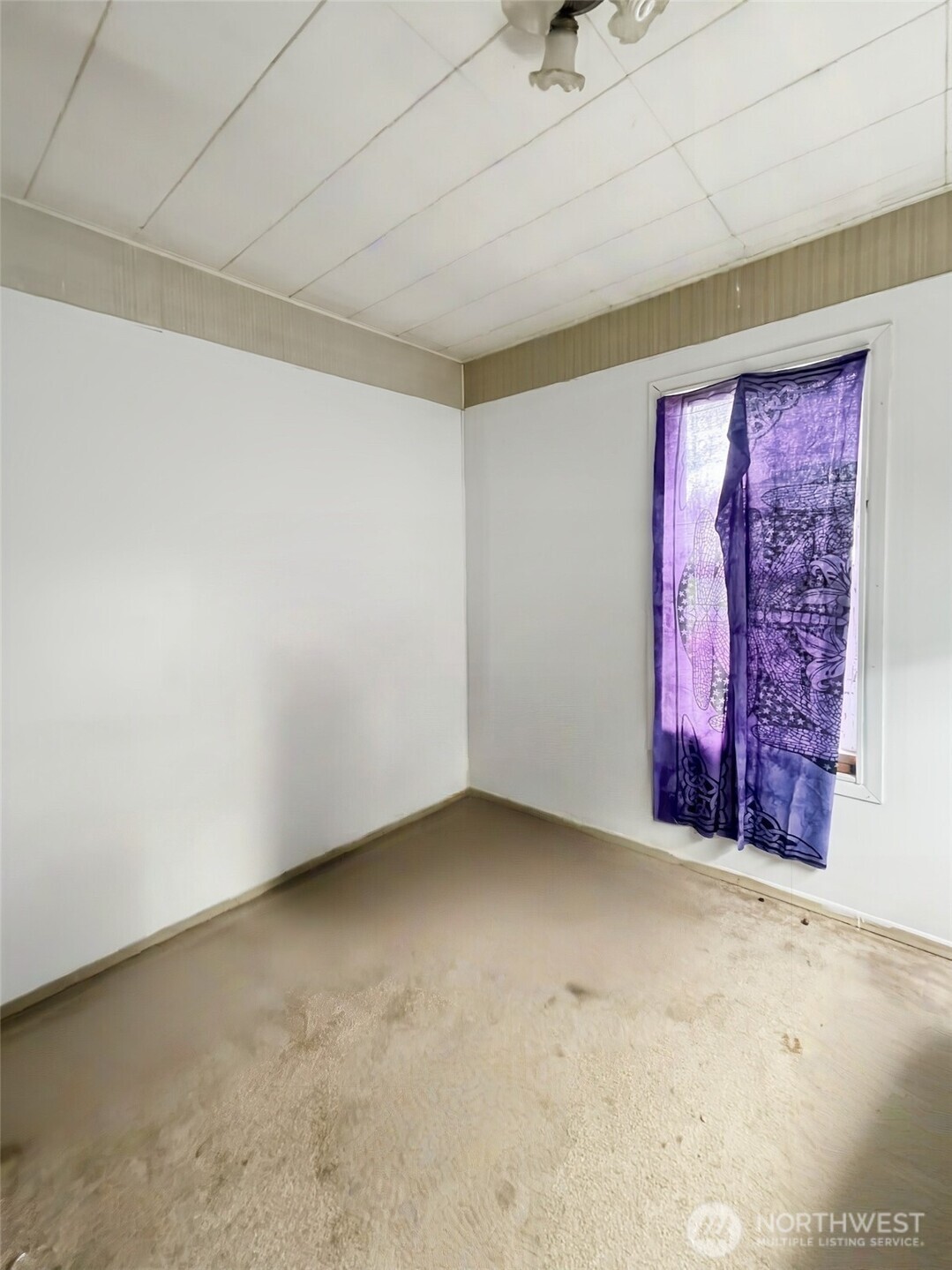 19 Fairley Street Raymond, WA 98577 - Photo 12 of 17 an empty room with windows