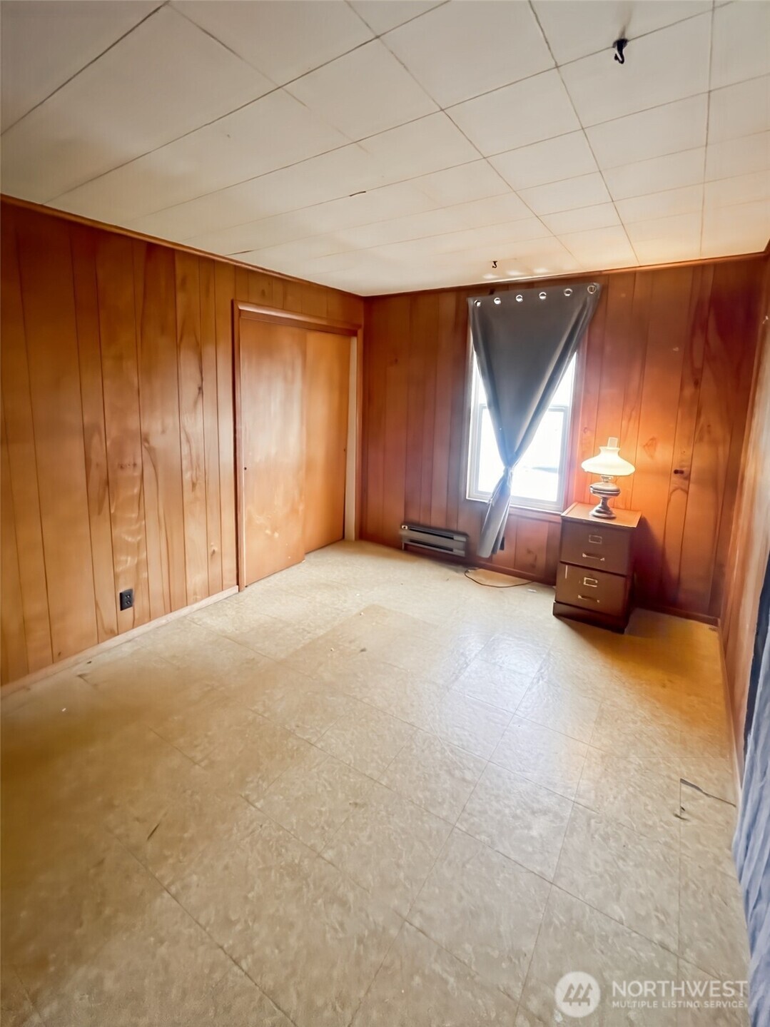 19 Fairley Street Raymond, WA 98577 - Photo 13 of 17 a view of an empty room with a window