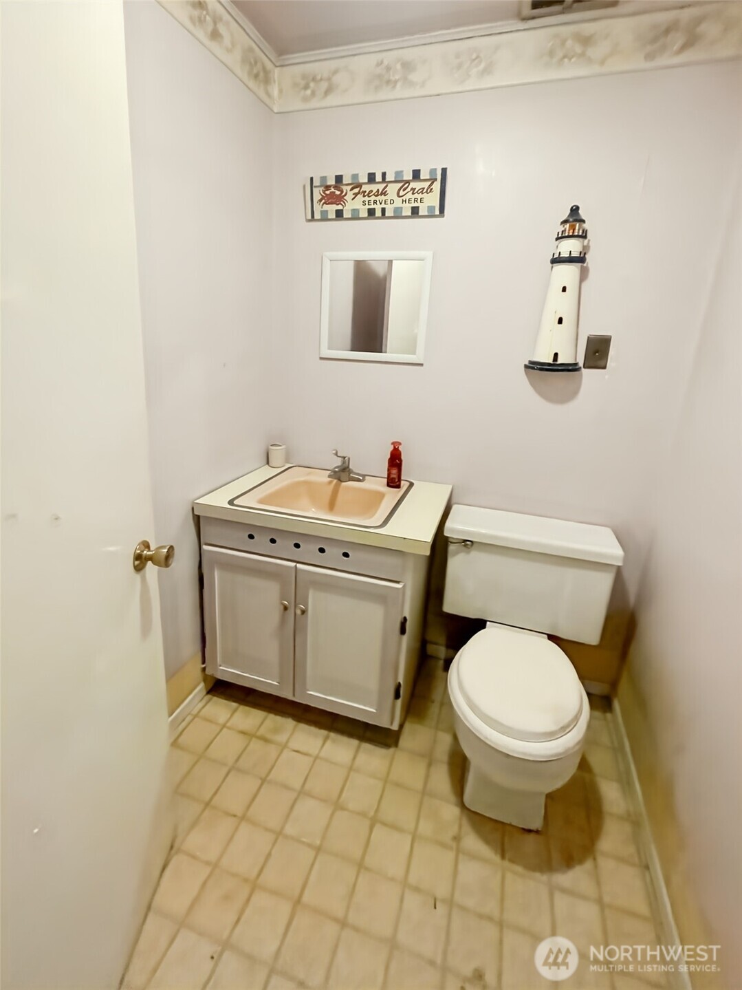 19 Fairley Street Raymond, WA 98577 - Photo 14 of 17 a bathroom with a sink toilet and mirror