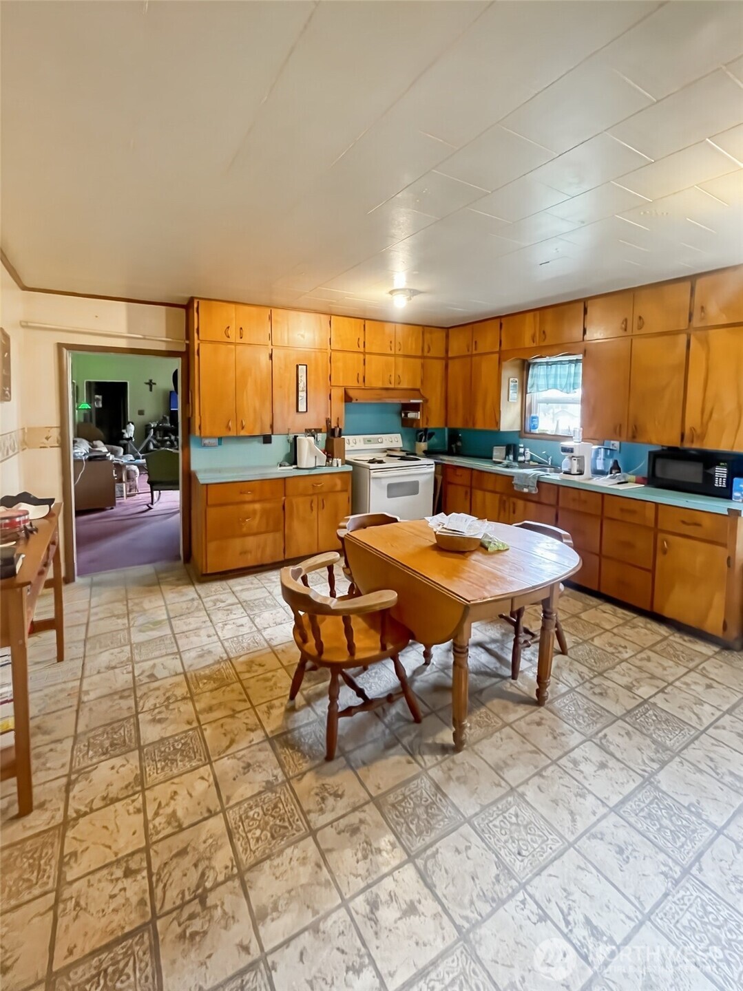 19 Fairley Street Raymond, WA 98577 - Photo 9 of 17 a balcony with furniture and outdoor view