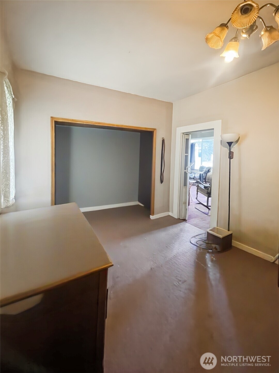 19 Fairley Street Raymond, WA 98577 - Photo 10 of 17 a view of an empty room with a fireplace