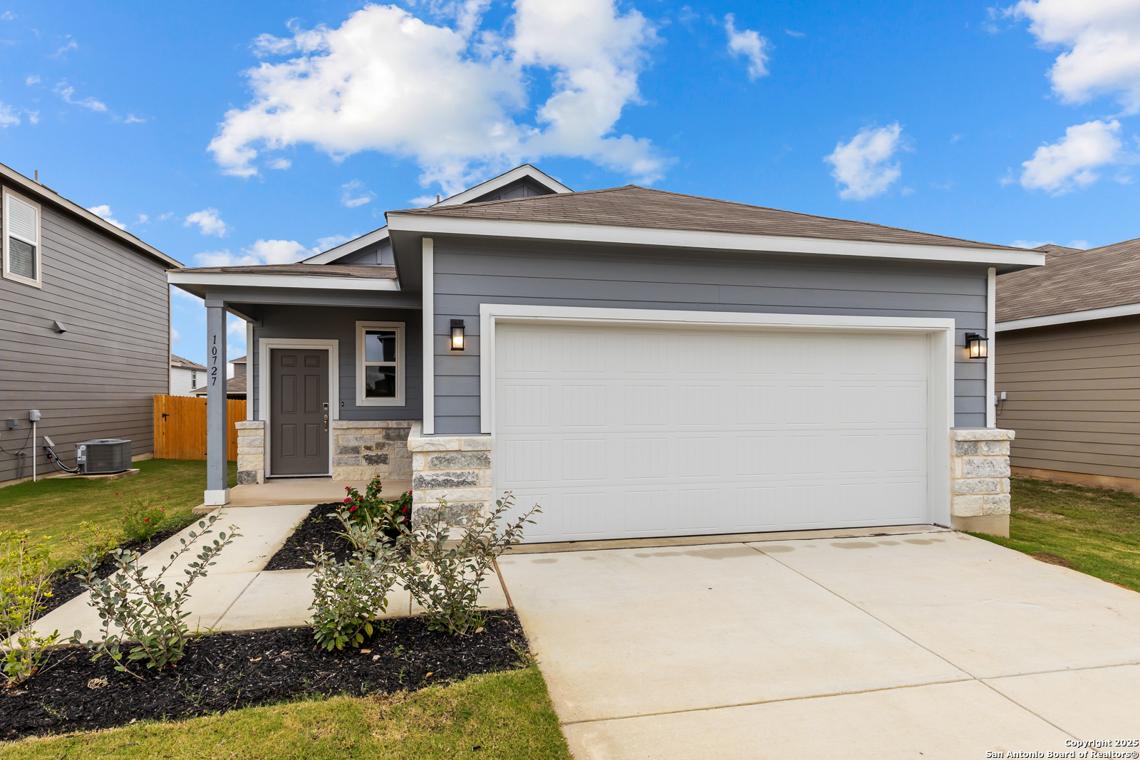 10727 Gilmore Garden Converse, TX 78109 - Photo 1 of 1 a front view of a house with garden