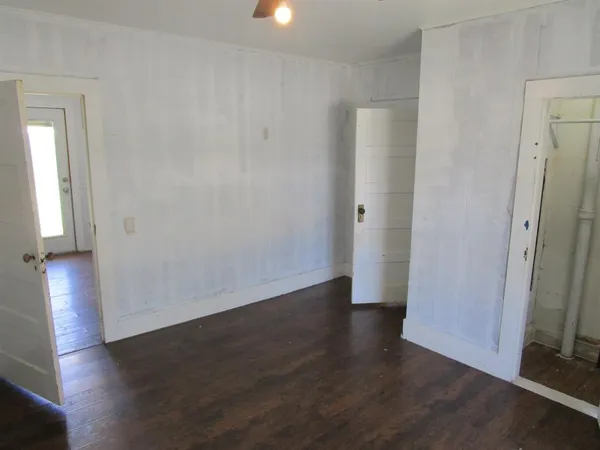 a kitchen with a stove and a refrigerator