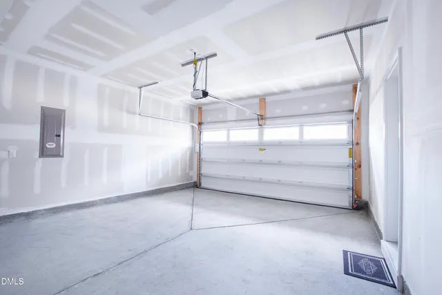 a view of roof deck with wooden floor and fence