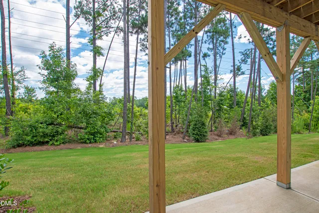 a view of a building with a swimming pool