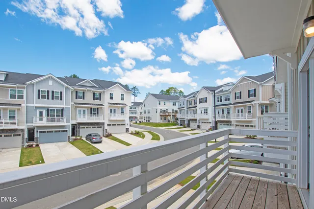 a view of swimming pool is middle in the garden