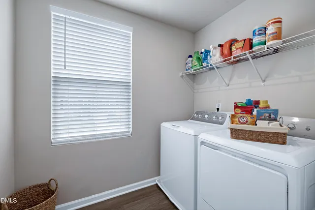 a storage room with washer and dryer