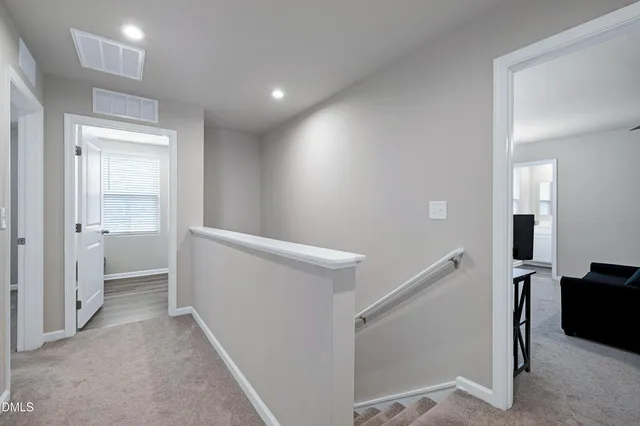 a view of hallway with livingroom