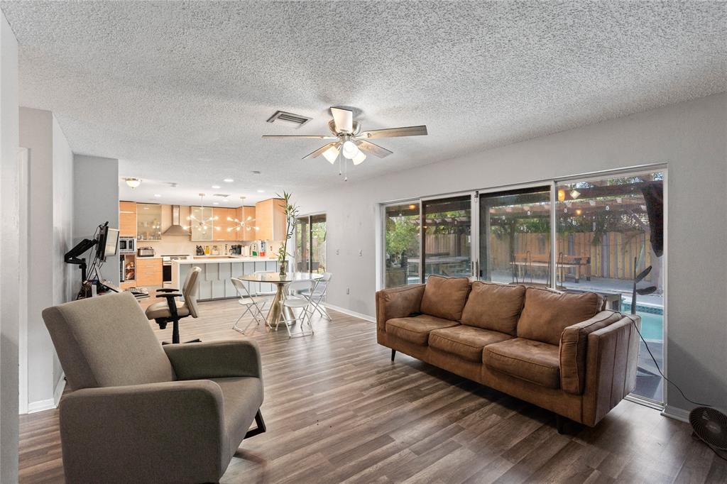 520 Sumter Avenue Davie, FL 33325 - Photo 15 of 44 a living room with furniture and a large window