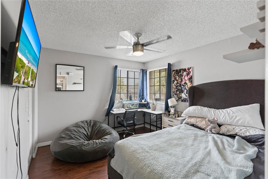 520 Sumter Avenue Davie, FL 33325 - Photo 21 of 44 a bedroom with furniture and a large window