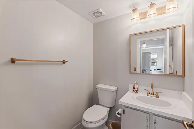 a view of a house with swimming pool and a porch