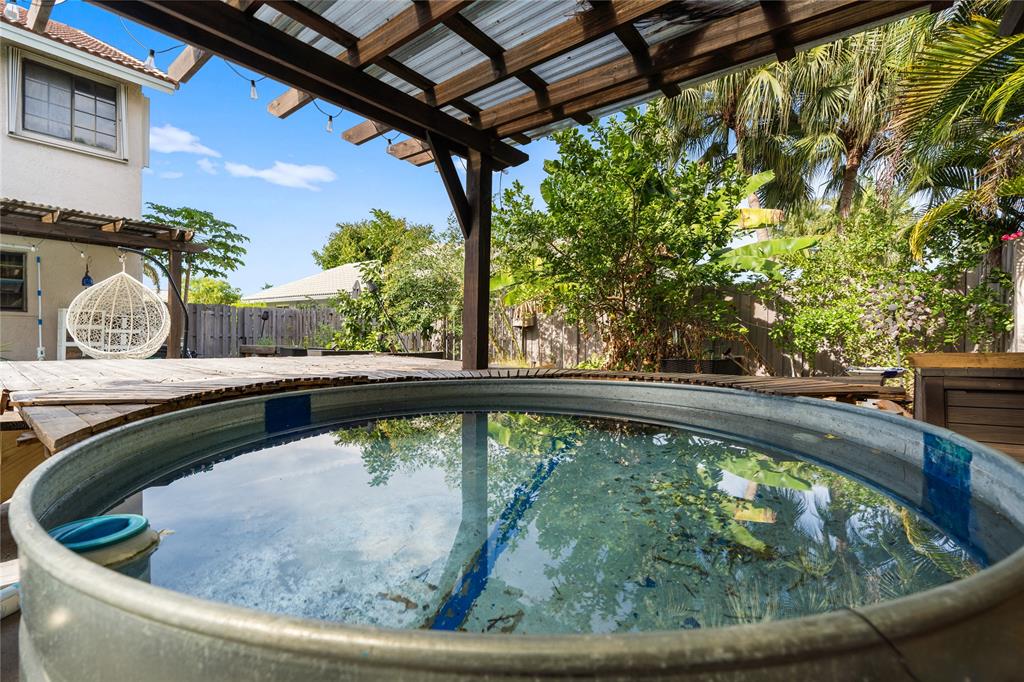 520 Sumter Avenue Davie, FL 33325 - Photo 43 of 44 a view of swimming pool with a outdoor seating