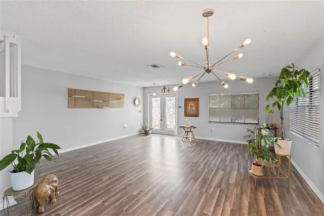 a view of an dining room and wooden floor