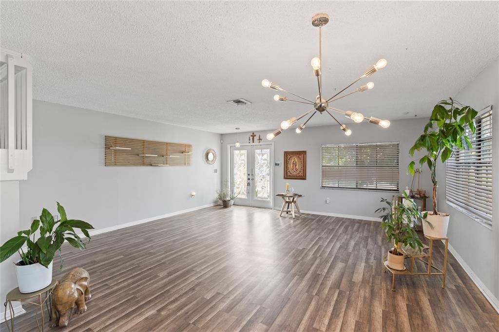 520 Sumter Avenue Davie, FL 33325 - Photo 5 of 44 a view of an dining room and wooden floor
