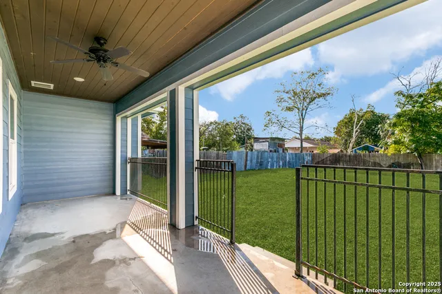 a view of a porch with a garden