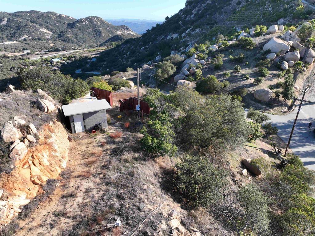 Rainbow Peaks Trail Fallbrook, CA 92028 - Photo 8 of 48 a view of a houses with a yard