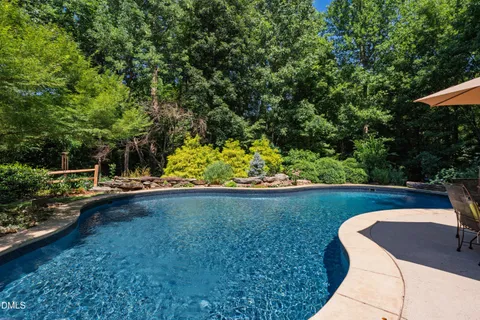 $975,000 | 212 Middlegreen Place, Holly Springs, NC 27540