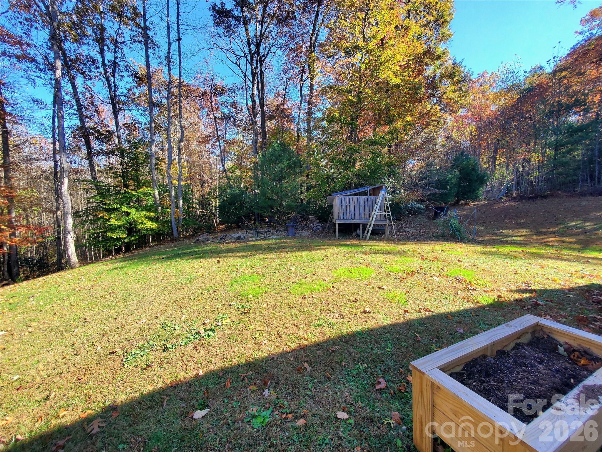 457 Dale Road Spruce Pine, NC 28777 - Photo 2 of 36 a view of an outdoor space pool patio and garden