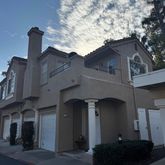 a front view of a house with a garage