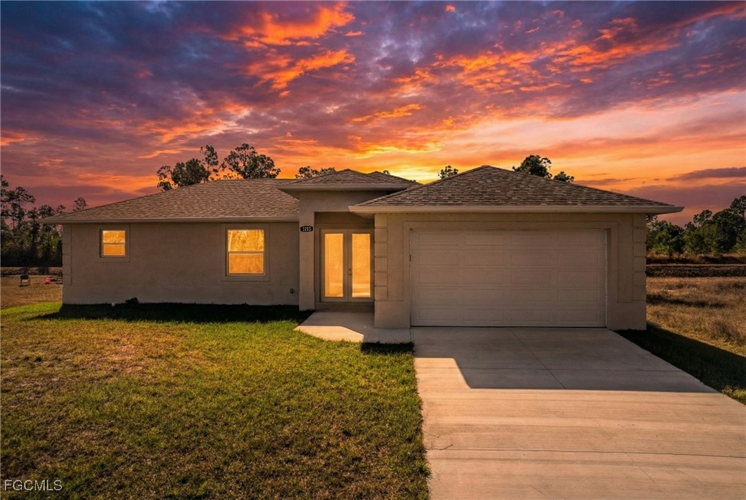 a view of a house with a garden