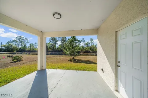 a view of swimming pool from a balcony