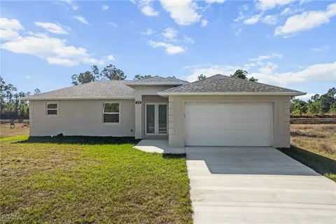 a view of a house with garden