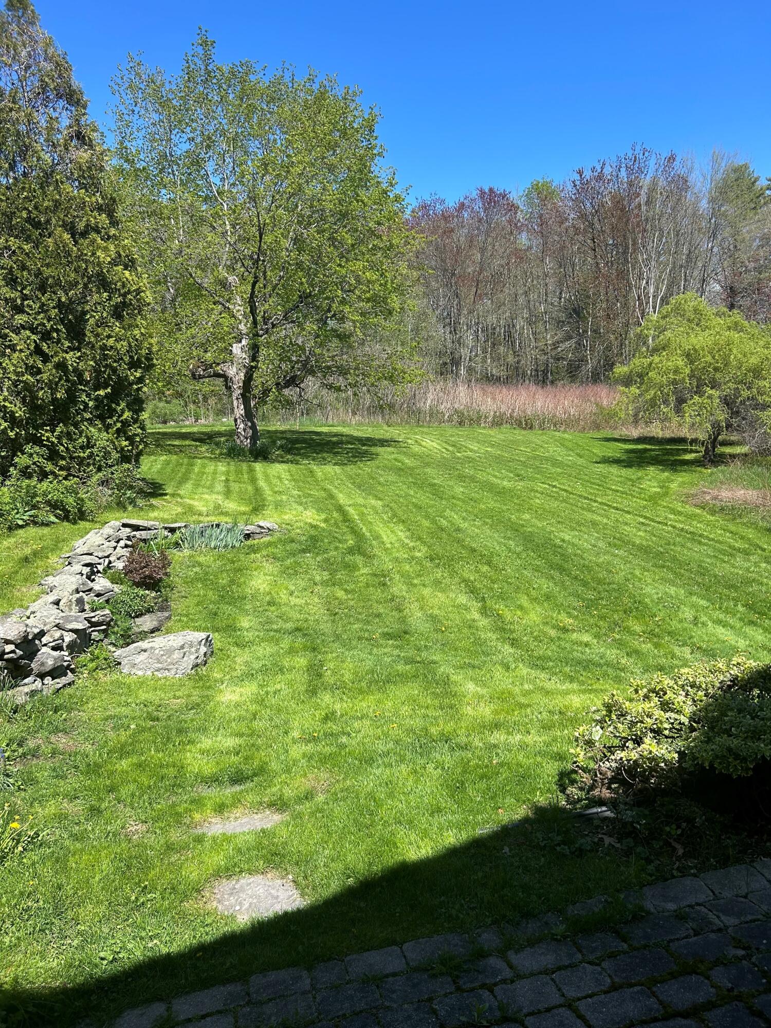 243 Falmouth Road Falmouth, ME 04105 - Photo 37 of 39 sunny backyard