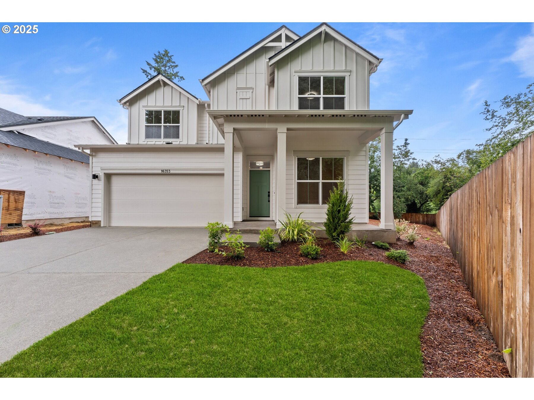 16353 Southwest Cambridge Lane Durham, OR 97224 - Photo 1 of 21 a view of an house with backyard and garden
