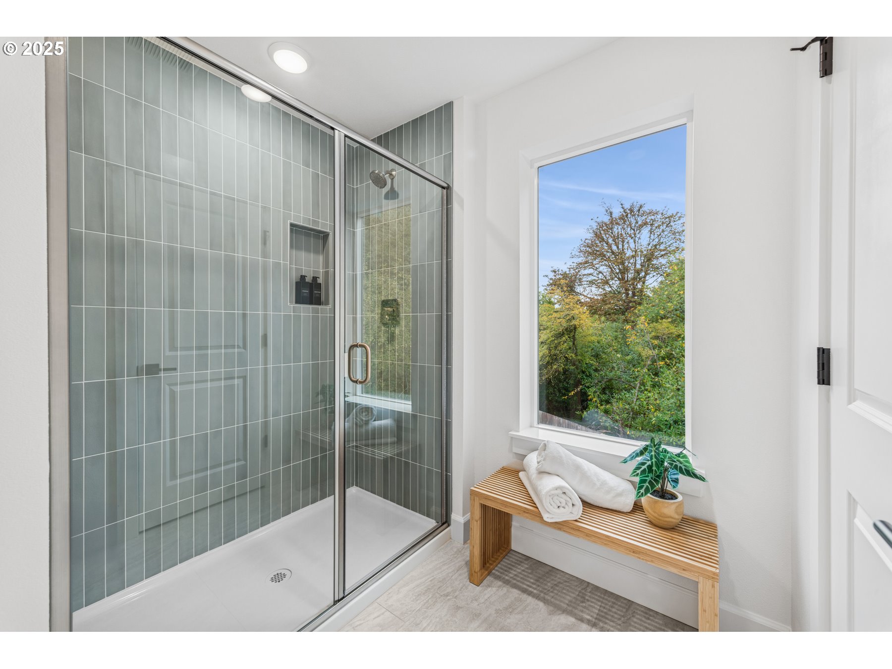 16353 Southwest Cambridge Lane Durham, OR 97224 - Photo 17 of 21 a bathroom with a tub shower and window