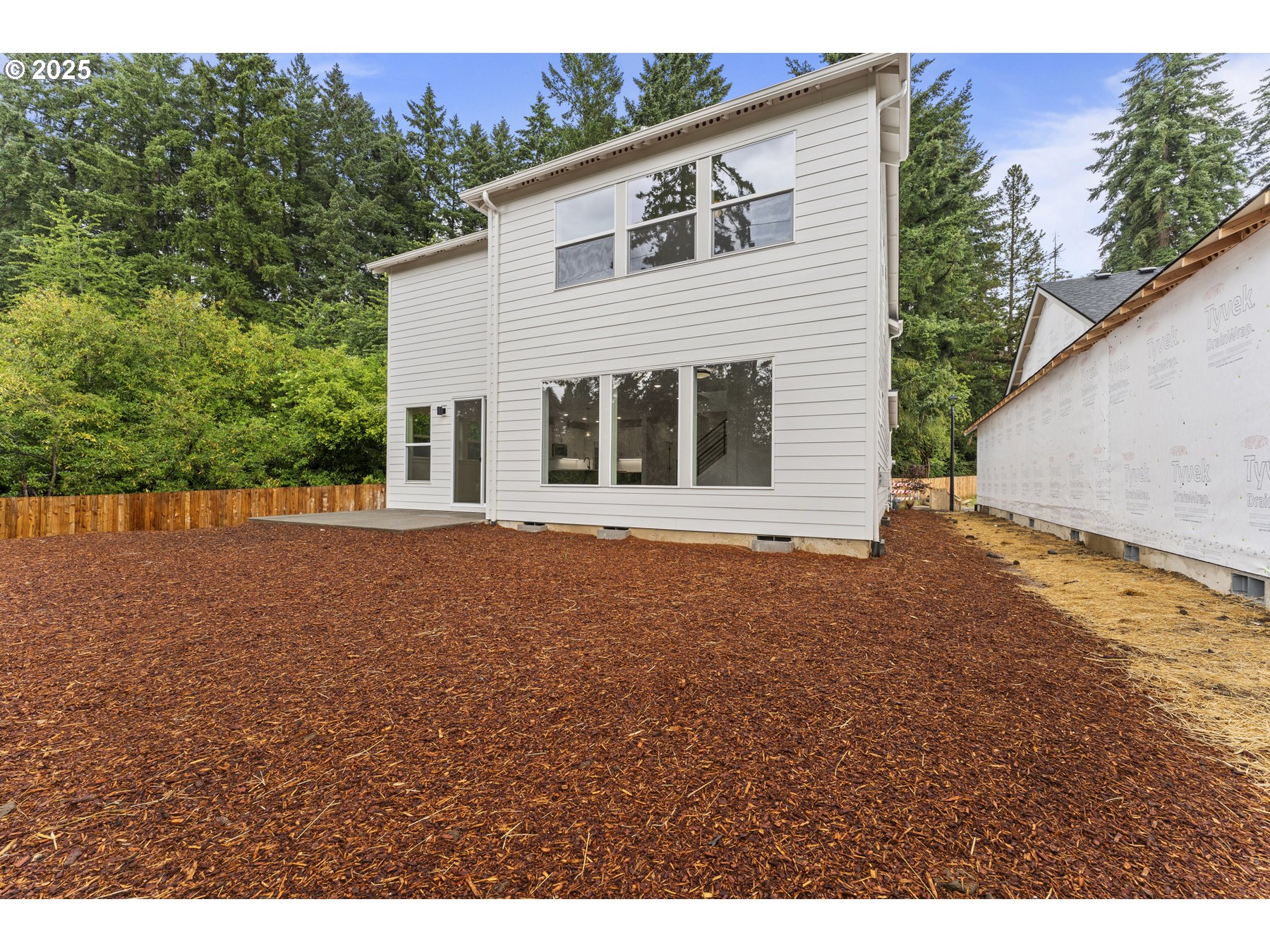 16353 Southwest Cambridge Lane Durham, OR 97224 - Photo 20 of 21 a front view of a house with a yard and garage