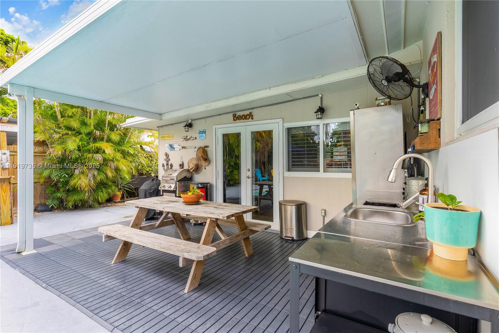 20130 Southwest 106th Court Cutler Bay, FL 33189 - Photo 23 of 42 a living room with furniture and a large window