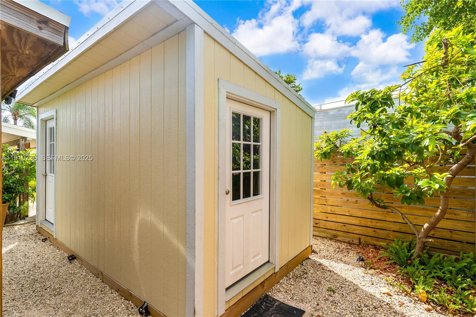 20130 Southwest 106th Court Cutler Bay, FL 33189 - Photo 32 of 42 a view of a house with a backyard