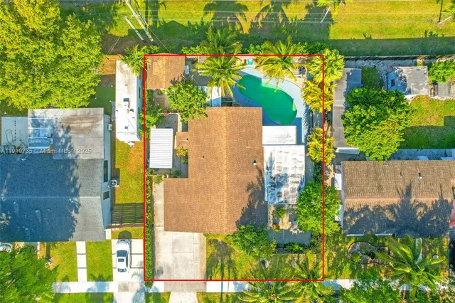 a view of a swimming pool with an outdoor space